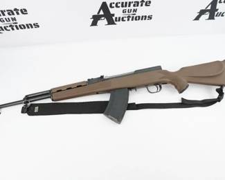 This is a numbers matching Russian made SKS chambered in 7.62x39 mm. It is outfitted with a synthetic stock and one plastic magazine. The rifle is in excellent condition showing minimal signs of use and wear.