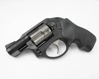 Ruger's LCR is a lightweight, small-frame revolver with a uniquely smooth trigger and highly manageable recoil. It features a monolithic frame with a grip peg allowing for use of a variety of grip styles, and an extensively fluted, high-strength stainless steel cylinder with a PVD finish for excellent durability. The patented, friction-reducing cam is a next generation design in fire control systems resulting in a smooth, non-stacking trigger pull. Its patented, polymer fire control housing holds the fire control components in their proper dimensional relationships, reduces weight significantly, and helps reduce recoil. LCR revolvers have a replaceable, pinned ramp front sight with white bar and an integral u-notch rear sight. LCR double action only revolvers have a 1.87" barrel excellent for concealed carry and are fitted with a Hogue Tamer Monogrip. This revolver is in excellent condition showing normal signs of use and wear.