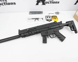 American Tactical GSG-16 German Sport Carbine 22 Long Rifle 16.28in Black Semi Automatic Rifle - 22+1 Rounds - The GSG-16 22lr Rifle is a light weight, tactical style rifle that is every plinking master's dream come true! Based off of the classic GSG 22 caliber rifle operating system, the GSG-16 features several enhancements to give it a new look for the next generation of shooters. The GSG-16 features a newly designed collapsible stock that also serves as an additional magazine storage compartment for either high or low capacity magazines. The re-designed forend features standard picatinny rails mounted onto an MLOK style hand guard. The cocking tube assembly features an ambidextrous charging handle so you can switch up charging rounds to meet your comfort style. The redesigned front and rear sight have been simplified and streamlined to give the shooter faster target acquisition over previous GSG models. This rifle comes in the original box and is in Excellent condition. 
