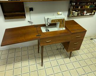 MCM sewing machine and cabinet. 