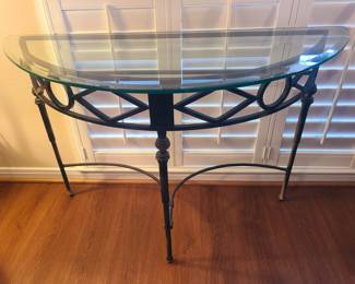 Half-moon glass top heavy wrought-iron base accent table