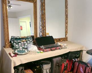 •LARGE ornate gold mirrors
• luggage 