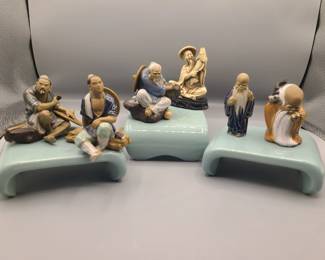 ▪︎ Chinese Pottery "mud men" figurines 
▪︎ Made in Italy Asian Figures in Ivoryine
▪︎ Vintage Oriental Hand Made Chinese Glazed Shiwan Clay Long Bearded Elder Longevity Wise Mud Man Statue Carrying Fruit & Holding Small Bird (far right)
