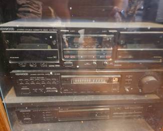 Kenwood Stereo System  - Sorry for the bad picture this door is jammed- Its on our list.