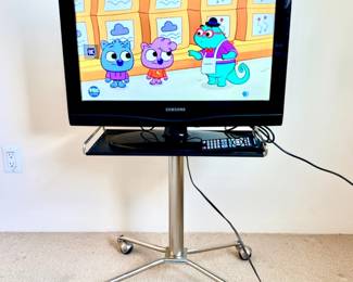 Mid-Century Rolling Side Table in Chrome on Caster Wheels with a 26" Samsung TV