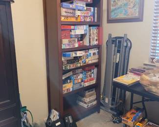 BOOKCASE AND PUZZLES.  ALSO GYM ROWING SET