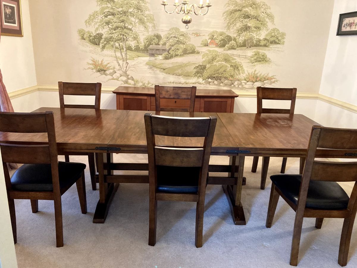 Table measures 108" x 44" x 30" with 2 18" leaves in place.