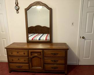 This dresser measures 64" x 18" x 30".  