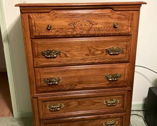 This tall dresser measures 51.5" x 38" x18".