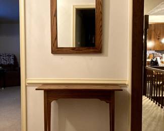 Solid wood table measures 24" x 36".  Mirror measures 24" x "36".