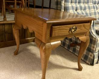 1 Solid wood end table measures 22" x 27" x 22.5".