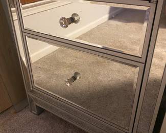 1 end mirror table no draws…. it’s a door with two shelves