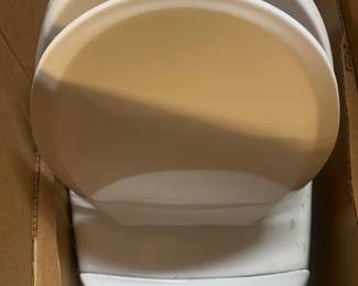Brand new open box toilet 🚽 bowl the back is curve and the handle is on top of bowl with dual buttons may not fix typical bathroom if the wall is close to current toilet.. will need space between wall and position