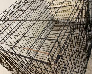 Huge dog cage lock is not perfect but has two point of entry and exit.. collapse to close
