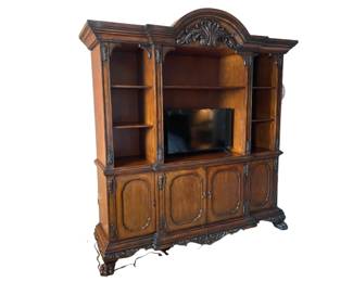 $750 - Large Wood Carved TV Entertainment Center Armoire Wardrobe NJ220-1                                                                 Description: Crafted from durable wood, this Large Wood Arch Top Carved TV Entertainment Center Armoire Wardrobe adds charm and functionality to any room. With its spacious design and elegant carved details, it offers plenty of storage for your TV, electronics, and other items, keeping your living space clutter-free and organized. Experience the perfect blend of style and practicality with this stunning entertainment center.

 Dimensions: 77 x 22 x 88

Condition:  Very good condition

Local pick up Rockville, MD.  Please contact us for shipper suggestions