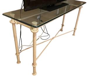 $800 - Mid-Century Mod Giacometti Style Wrought-Iron Glass  Console Table NJ220-33                                   Expertly crafted in the Mid-Century Modern style, this console table features the iconic Giacometti design of wrought iron and glass. The perfect addition to any living space, this table adds elegance and style with its sleek and timeless aesthetic.

Dimensions: 56 x 18 x 27"H

Condition:  Very good condition.  

Local pick up Rockville, MD.  Please contact us for shipper suggestions