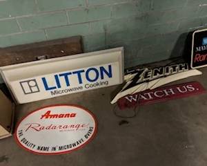 Vintage metal appliance related signs