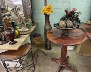Custom built round wood table, iron/wood entry table, and other decorative items