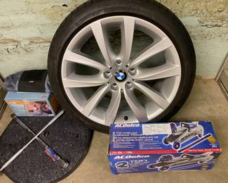 Used BMW run flat tire (good to have as a spare) and tire cover, hydraulic jack, 