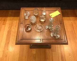 Dark wood Pedestal table with Crystal Pieces on top.