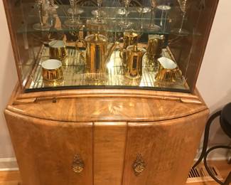 C. 1930 Art Deco Walnut Cocktail Cabinet with Champagne Glasses, and Gold Porcelain Appointments.