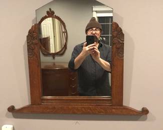 Carved Art Deco mirror.