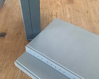 Item #105 Eva Hesse Catalog Raisonne, 2 Volumes in slipcase, minor scuffs on spines, scuffs on slipcase, $50