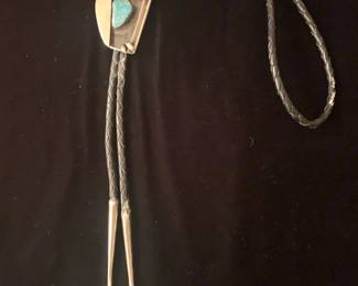 Item # 34 Ramone Platero (Navajo 1930-2003) modernist signed sterling and natural turquoise bolo, 2" x 1 1/2", ca 1970, $250