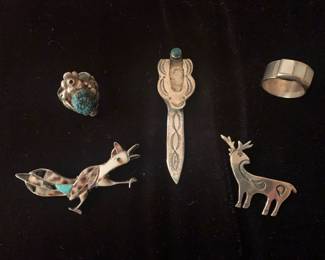 Item #37C sterling and MOP ring at right top, $50; 37D Zuni sterling and inlaid turquoise, jet and shell roadrunner pin at left bottom, $100; 37E sterling deer pin at lower right, $50. All vintage unsigned.