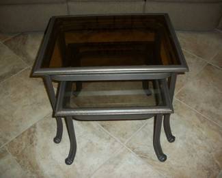 Garden Treasures Pair of Metal and Smokey glass Nesting Tables.