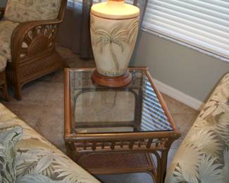 Kanes Furniture Rattan and Glass End Table #1 ; Pottery Palm Tree Table Lamp #1.