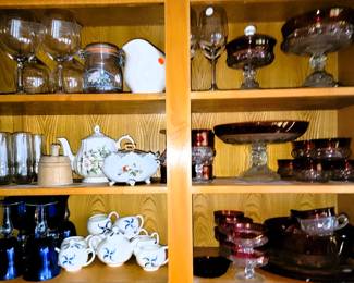 Cranberry Glass: Bowls, plates pedestal bowls. Individuals and sets. China tea sets, blue stemware, unique stemware