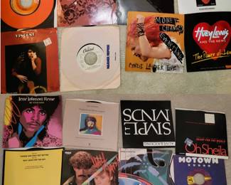 100s of vinyl records. Much country - some jazz and some 70s and 80s. Albums and singles