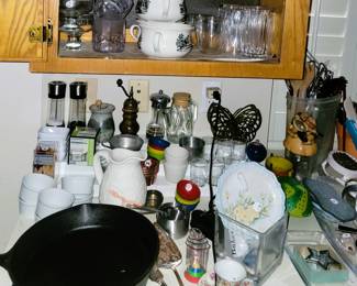 EVERYTHING for your kitchen - most never used: salt/pepper, measuring and serving, utensils, serving, ramekins, cutters. Name brand cast iron