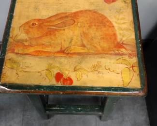 Solid wood stool with money on top.