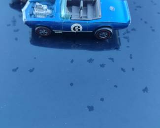 Three Red Line Hot Wheels.