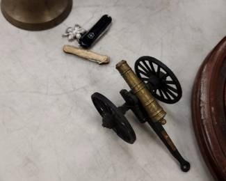 14 kgf pocket knife and toy cannon.
