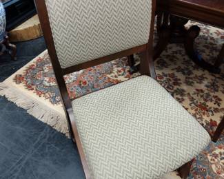 Upholstered wood chairs with table