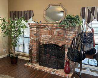 Fireplace screen, tools and a beautiful mirror