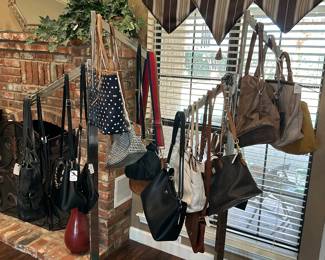 Lots of purses, including Dooney & Bourke