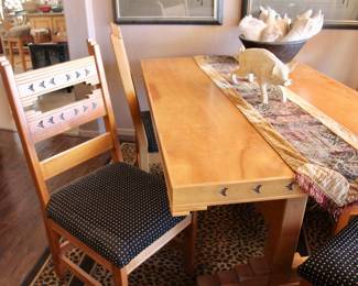 Light wood table with custom matching chairs 