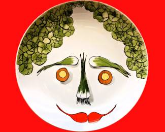 Dinner plate with veggie woman face 