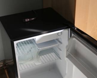 Several small refrigerators