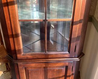 Mahogany Corner Cabinet 67" tall x 23" W. Perfect condition, gradual light, it works. $500