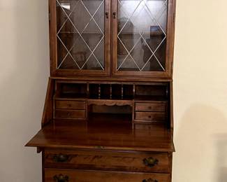 Rare Ethan Allen Heirloom Chippendale Style Maple Drop Secretary Desk and Hutch. From 1978. 76"x18"x35". Hutch is detachable. Desk can be used with or without hutch. Hutch is ornate with crown molding acroos the top. Two glass doors decorated by diamond pattern and opens up to reveal two shelves. 1970,  measurements: Desk H:41 xW 36" x D 18.50 Hutch H: 35"x W 34.50"x D: 9.50" $1,200