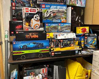 Empty Lego boxes and manuals only. We have a large amount of loose pieces and some partially assembled items.