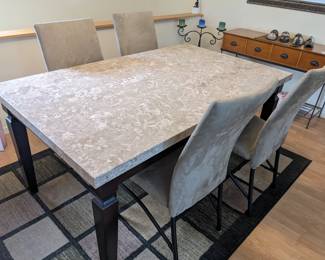 Inv no 003  Set of marble top table and 4 microsuede chairs.    table dimensions  64x38x30   table and chairs can be purchased seprately table only inv no is 001   chairs only inv no is 002