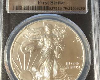 2015 Graded Silver Eagle 1 Oz bullion 
Bid online https://missdonnas.hibid.com