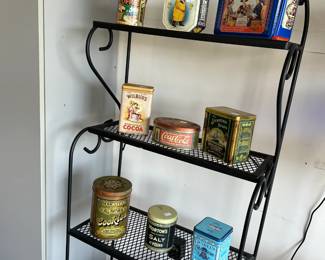 Bakers rack with Assorted Collectable Tins