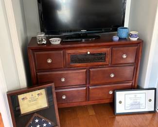 Television and Stand with Military Memorabilia